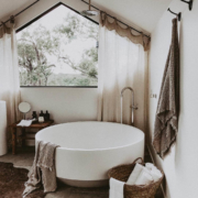 Ensuite at The Cabin, Byron Beach Abodes with round stone bath
