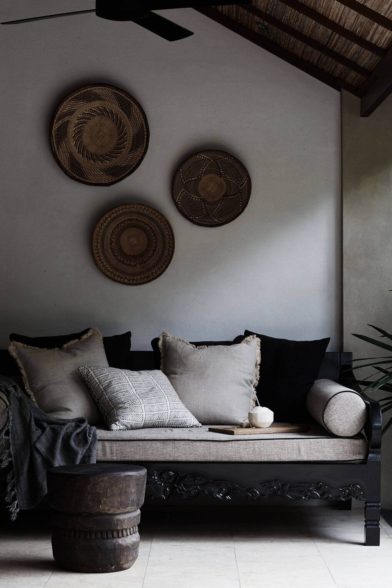 Textured wall hangings above daybed at The Villas of Byron