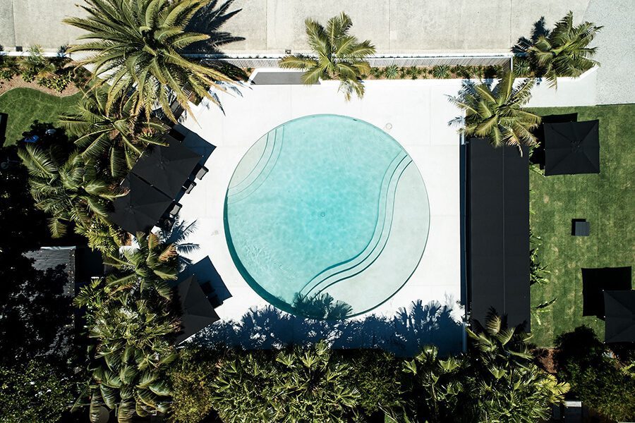  Overhead image of round pool and tropical gardens, The Bower Byron Bay