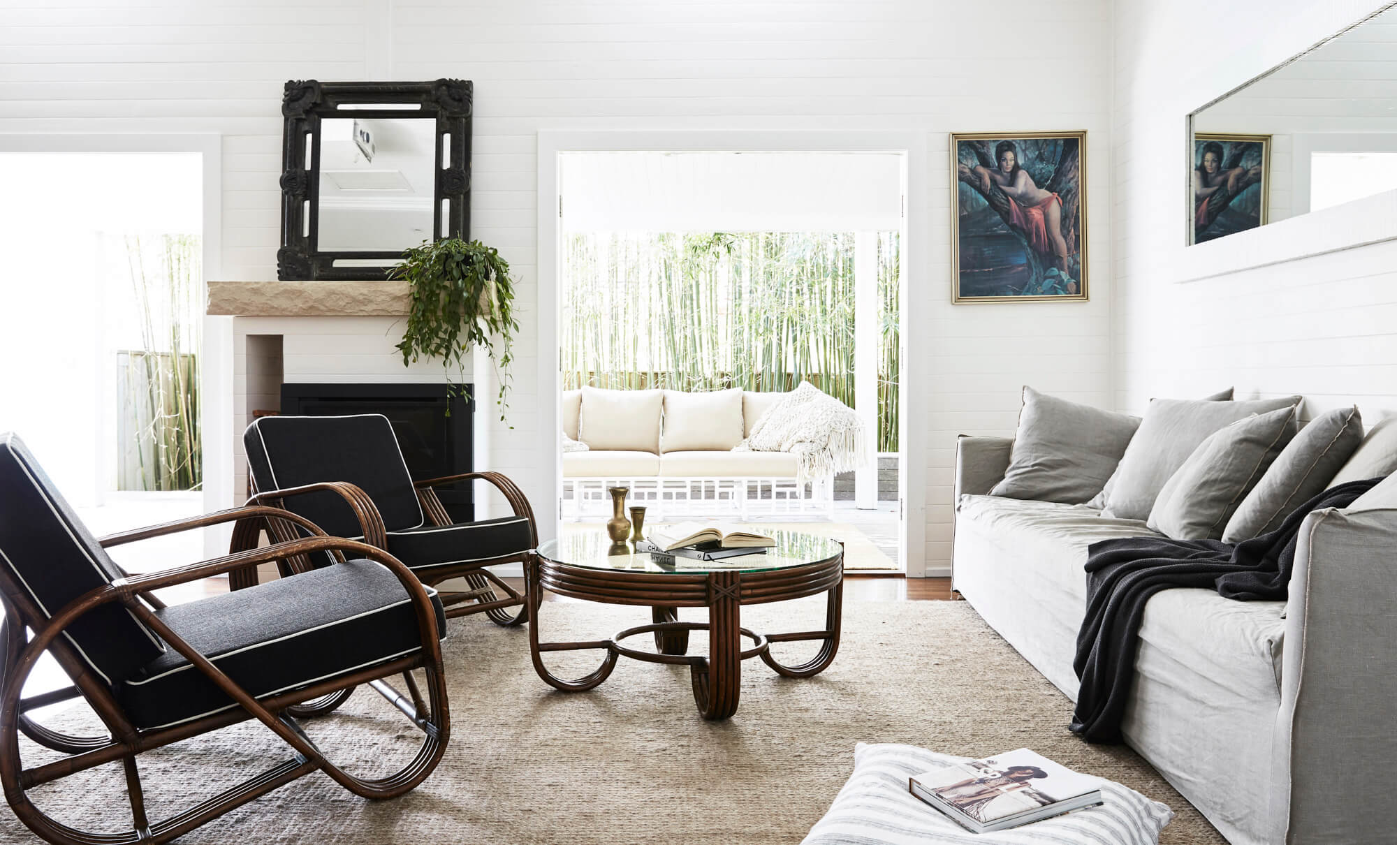 Interior styling of The Cottage, Byron Beach Abodes with MCM House lounge and vintage pretzel chairs and coffee table