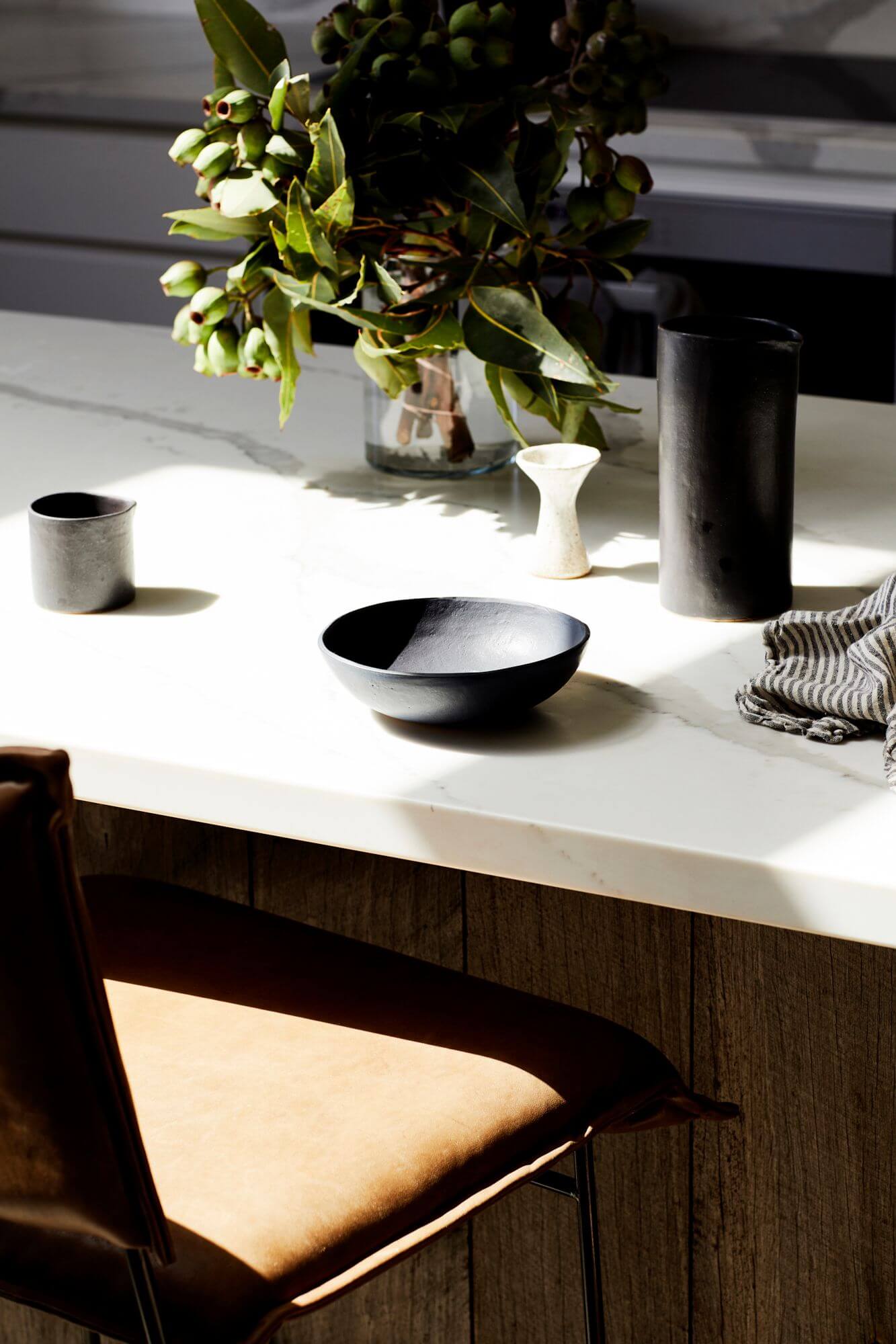 Handmade ceramics on the marble benchtop at The Lodge, Byron Beach Abodes