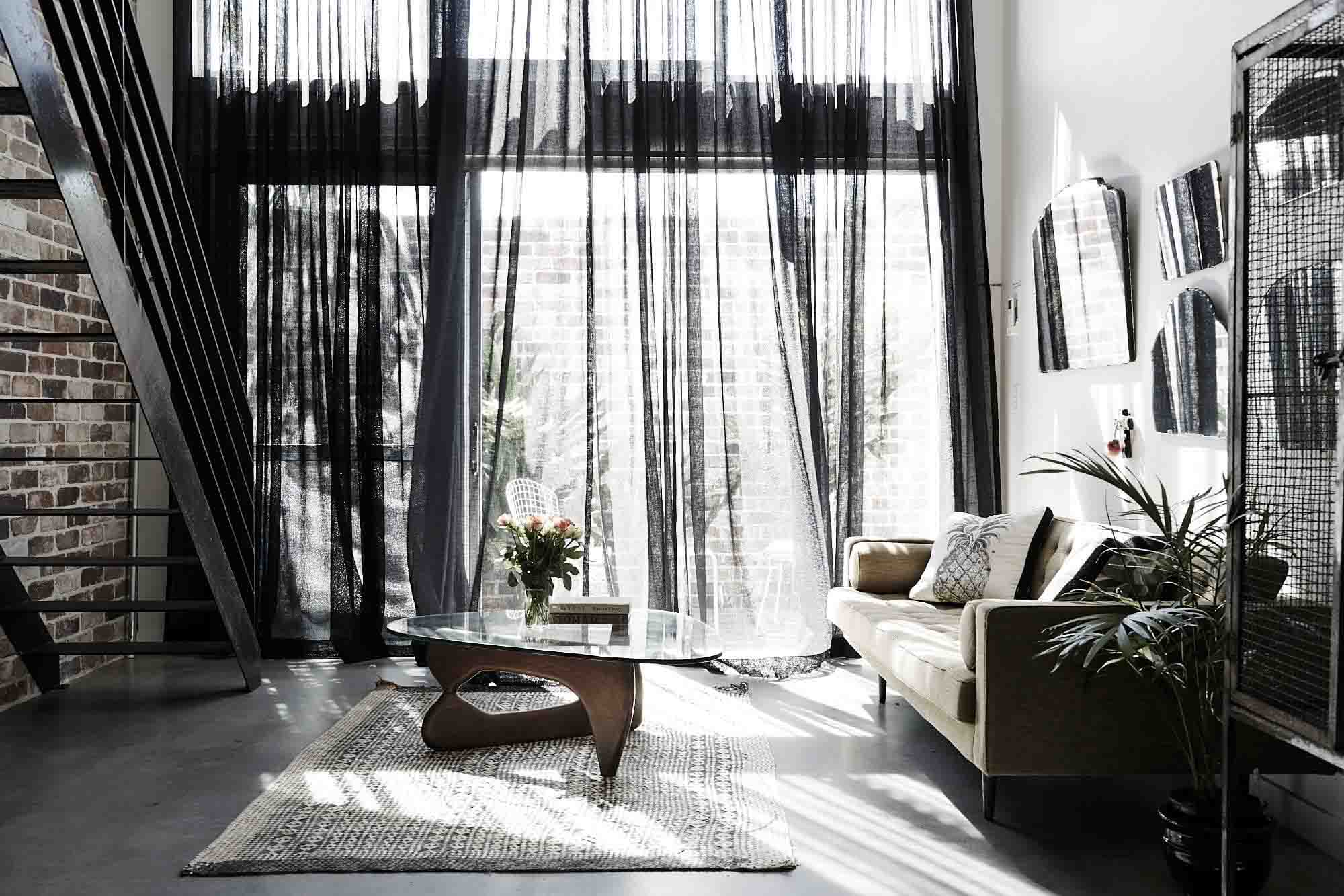 Floor to ceiling black linen curtains at The Chapel, Byron Beach Abodes